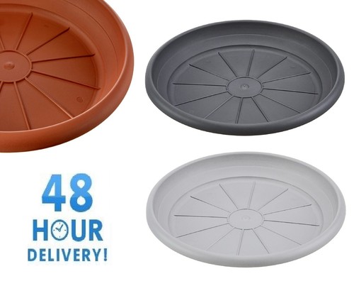 Round black plastic plant - round,